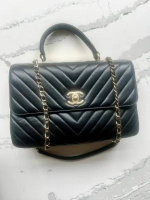 Chanel trendy black chevron bag with gold hardware