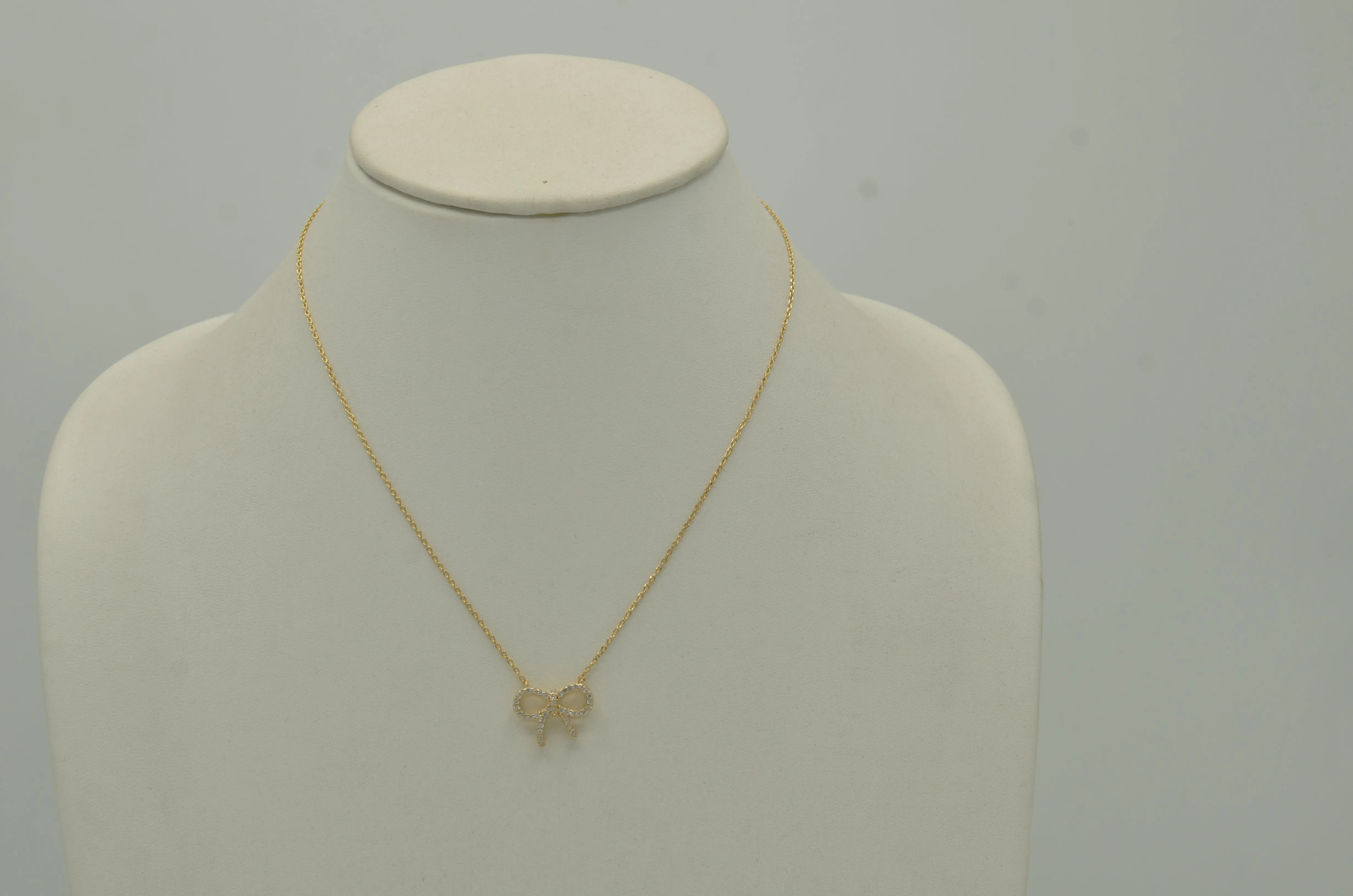 Gold Crystal Bow Pendant Necklace# HNN90868G(SA10)